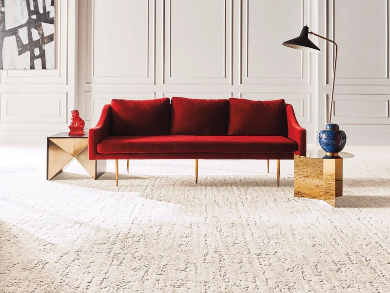 red couch on carpet - Roberts Carpeting and Fine Floors in PA